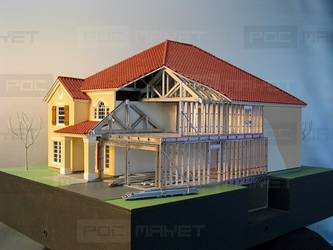 Архитектурный макет загородного дома с разрезом